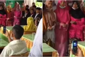 Viral sosok ayah rekam aksi anak di sekolah pakai HP jadul, salut