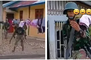 Momen anggota TNI latihan perang malah nyangkut di jemuran warga