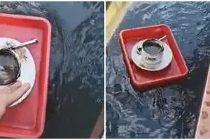 Aksi unik penjual antar pesanan kopi lewat selokan, gagal estetik