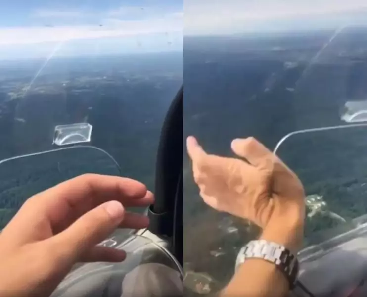 aksi mengeluarkan tangan dari jendela pesawat © 2021 brilio.net aksi mengeluarkan tangan dari jendela pesawat © 2021 brilio.net