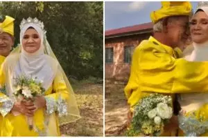 Rayakan anniversary ke-53, pasangan ini dandan pakai baju pengantin