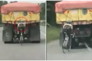 Tak patut ditiru, aksi pesepeda mepet truk ini tuai kecaman