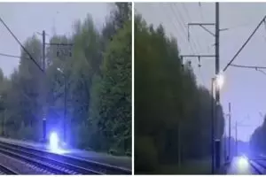 Viral cahaya biru melintas di rel kereta, diduga bola petir