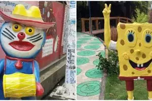 11 Penampakan patung tokoh kartun ini bikin garuk kepala