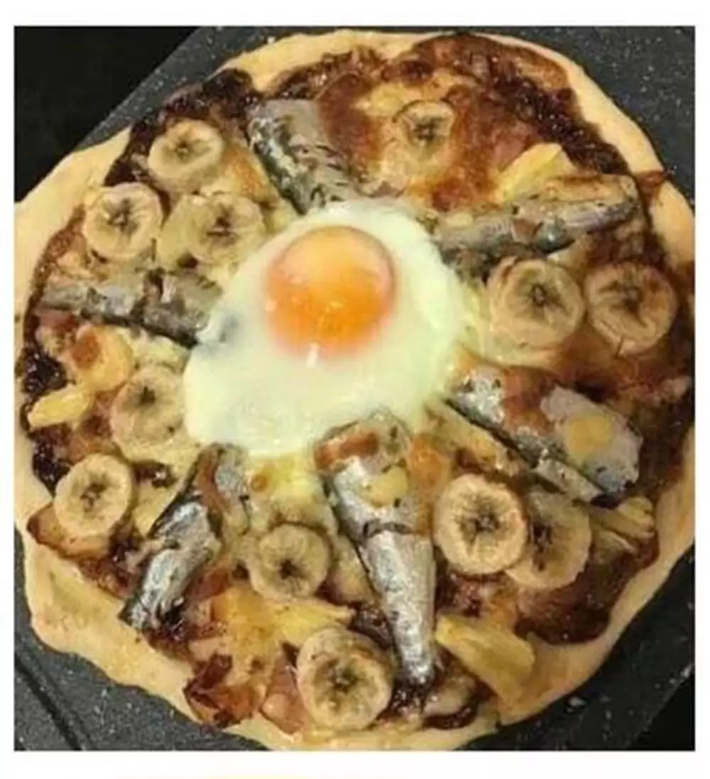 cara antimainstream makan pizza © 2022 berbagai sumber