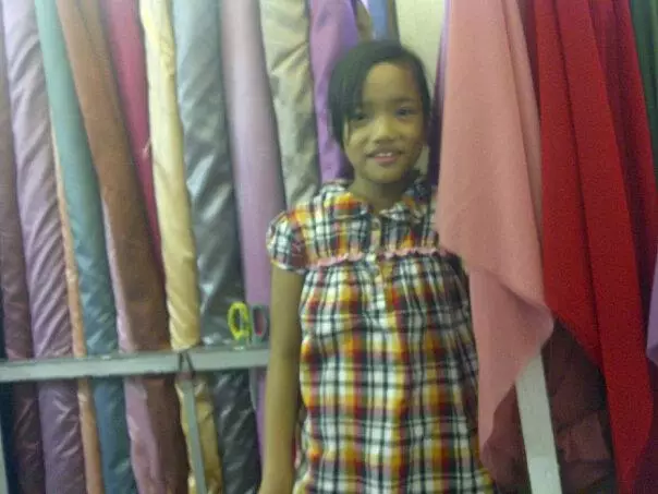 Fuji jaga toko kain © Facebook