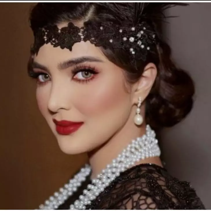 9 Gaya Ashanty di acara launching skincare, pilih look era 1920-an