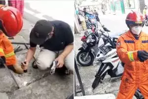 Petugas damkar gerak cepat evakuasi uang Rp 100 ribu di gorong-gorong