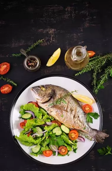 Arti mimpi makan ikan freepik.com