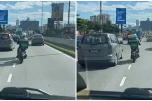 Aksi heroik driver ojol bantu buka jalan untuk ambulans, tuai pujian