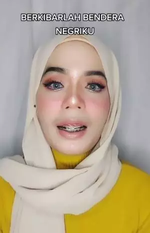 Wanita ini gambar burung garuda di wajah TikTok Wanita ini gambar burung garuda di wajah TikTok