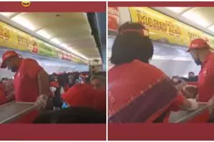 Momen bos AirAsia tak segan bantu tugas pramugari, bikin salut
