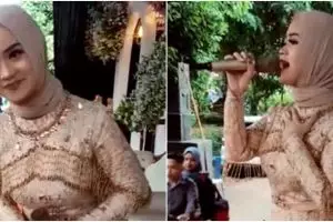 Aksi biduan nyanyi di panggung hajatan nikahan ini antimainstream, disawer drive thru sopir dalam bus