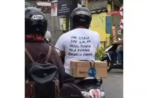 Bikin nggak konsen, 11 tulisan aneh di baju ini ngawurnya minta ampun