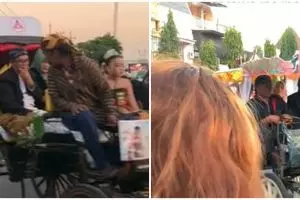 Niat hati abadikan pawai Grebeg Suro, yang dilakukan oleh emak-emak ini malah bikin geleng kepala