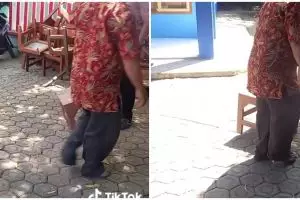 Cara pria turunkan kursi dari lantai dua ini kreatif nan nyeleneh abis, mudah tapi berisiko