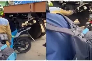 Sulitnya sabar saat macet bikin pengendara motor ini nyelip di kolong truk kontainer, aksinya ngeri