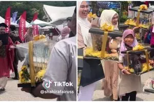 Wisuda berasa nikahan, aksi keluarga bawakan hadiah ala seserahan ini kece abis, isinya unik banget