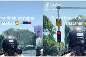 Trik biar leher nggak kepanasan saat nyetir motor ala cowok ini bikin pengendara lain gagal fokus