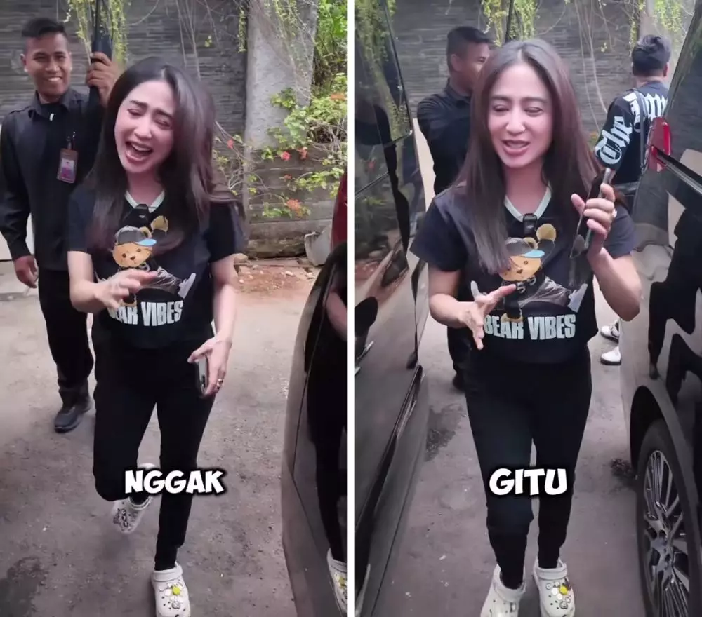 dewi perssik tolak dipayungi © 2024 Instagram