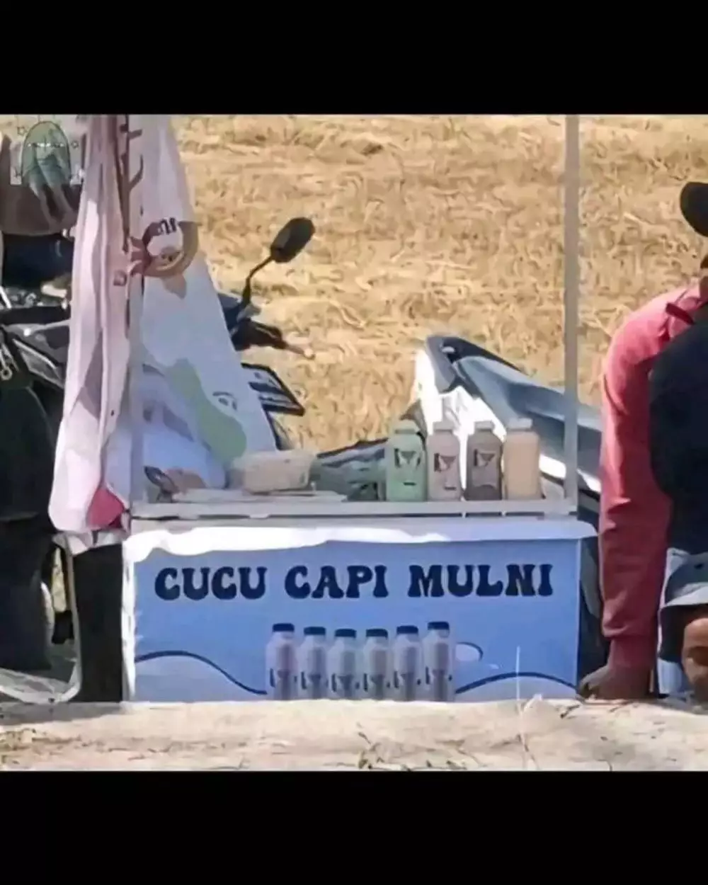 tulisan penjual es © X