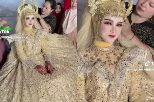 Di tengah gempuran serba simpel, pengantin ini tampil pakai gaun petticoat, penampilannya tuai atensi