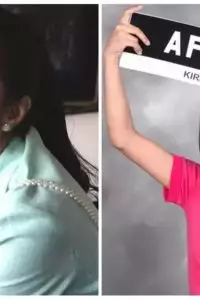 Rambut berponi belah samping jadi gayanya yang khas.