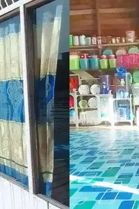 Meski tidak dilengkapi perabotan mewah, dapur sederhana di rumah panggung ini tampak begitu rapi dan bersih.