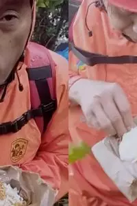 Di tengah medan yang sangat curam dan cuaca ekstrem, anggota tim SAR terekam tetap bersyukur meski hanya bisa menyantap nasi dan mie instan.