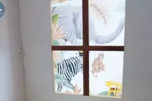 10 Portraits of Dinda Hauw & Rey M Shadow's children's bedroom with a safari theme, the facilities make you feel at home